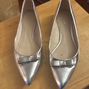 Coach woman’s flat shoes.